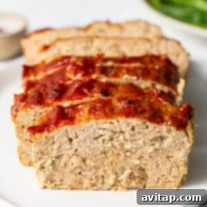Ground turkey meatloaf on a plate, ready to be enjoyed.