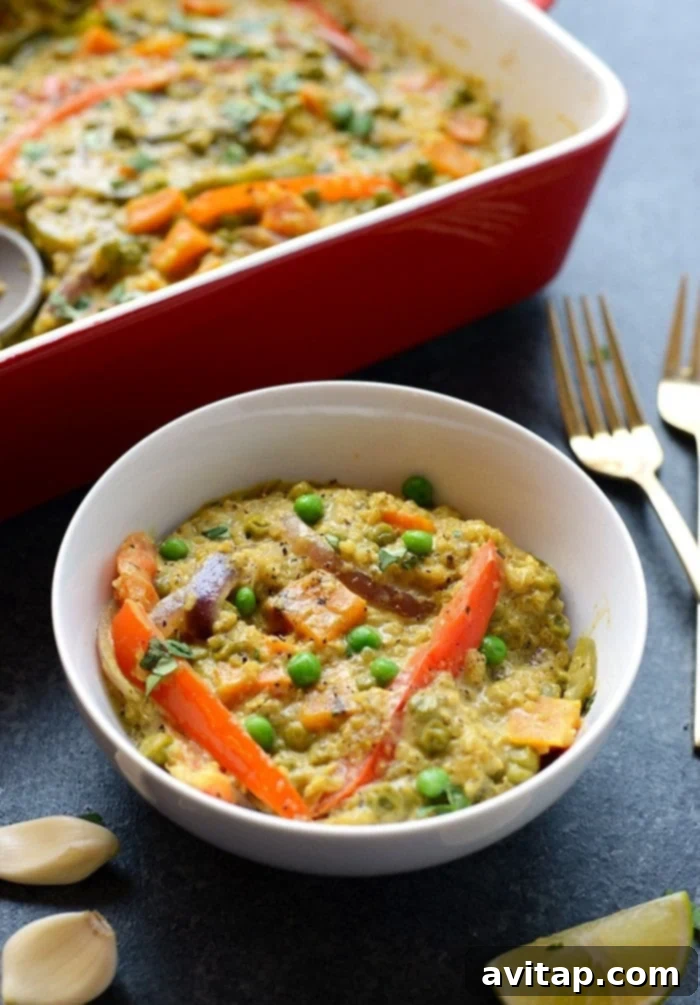 A close-up of the Sweet Potato Green Curry Quinoa Casserole, showcasing the vibrant colors of the vegetables and the creamy texture of the curry, inviting a taste.