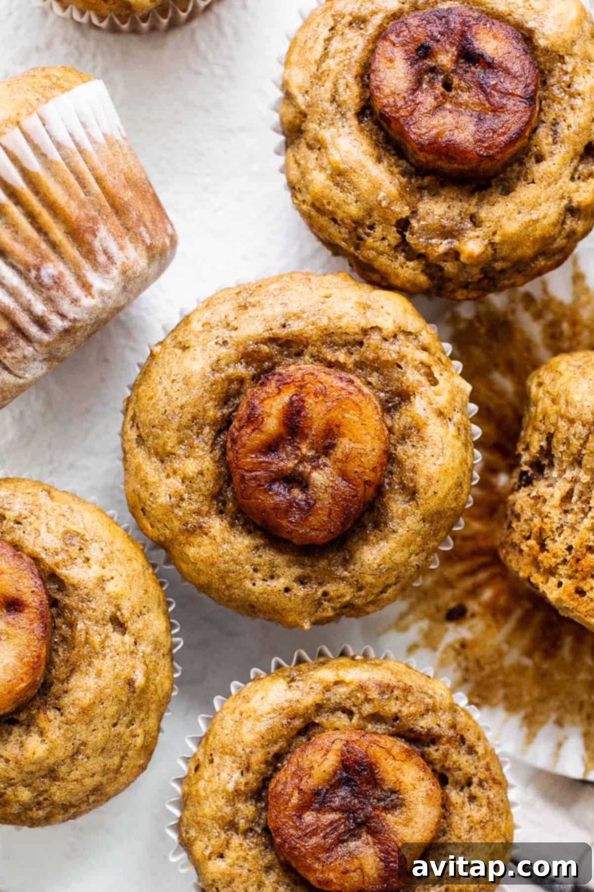 Gourmet Bananas Foster Muffins: A Sweet Indulgence Delicious Bananas Foster Muffins with caramelized banana topping, ready to be enjoyed as a gourmet snack.