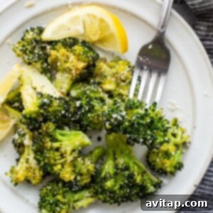 Roasted broccoli on a plate, ready to be served.