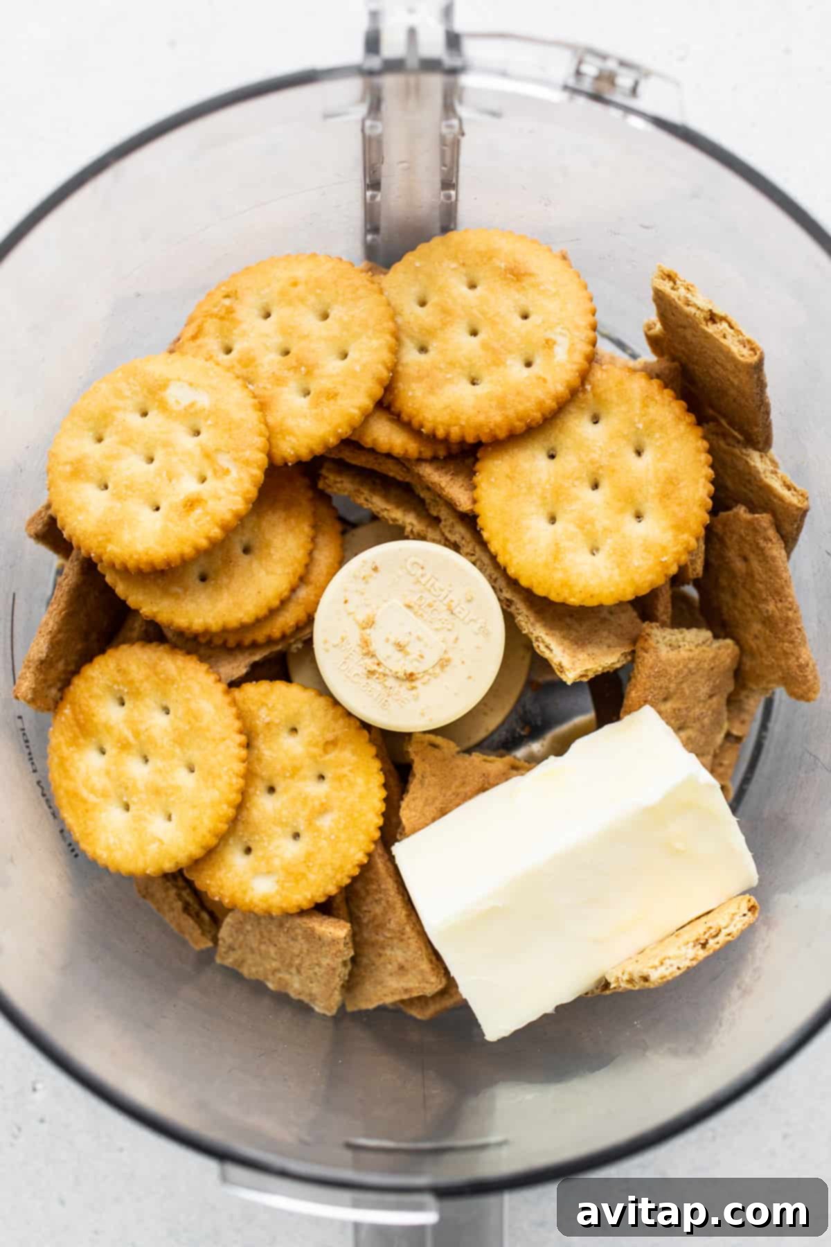 This mini cheesecake recipe is made with a sweet and salty crust, cream cheese, honey, vanilla, and lemon zest making them the perfect Spring dessert. making crust in food processor.