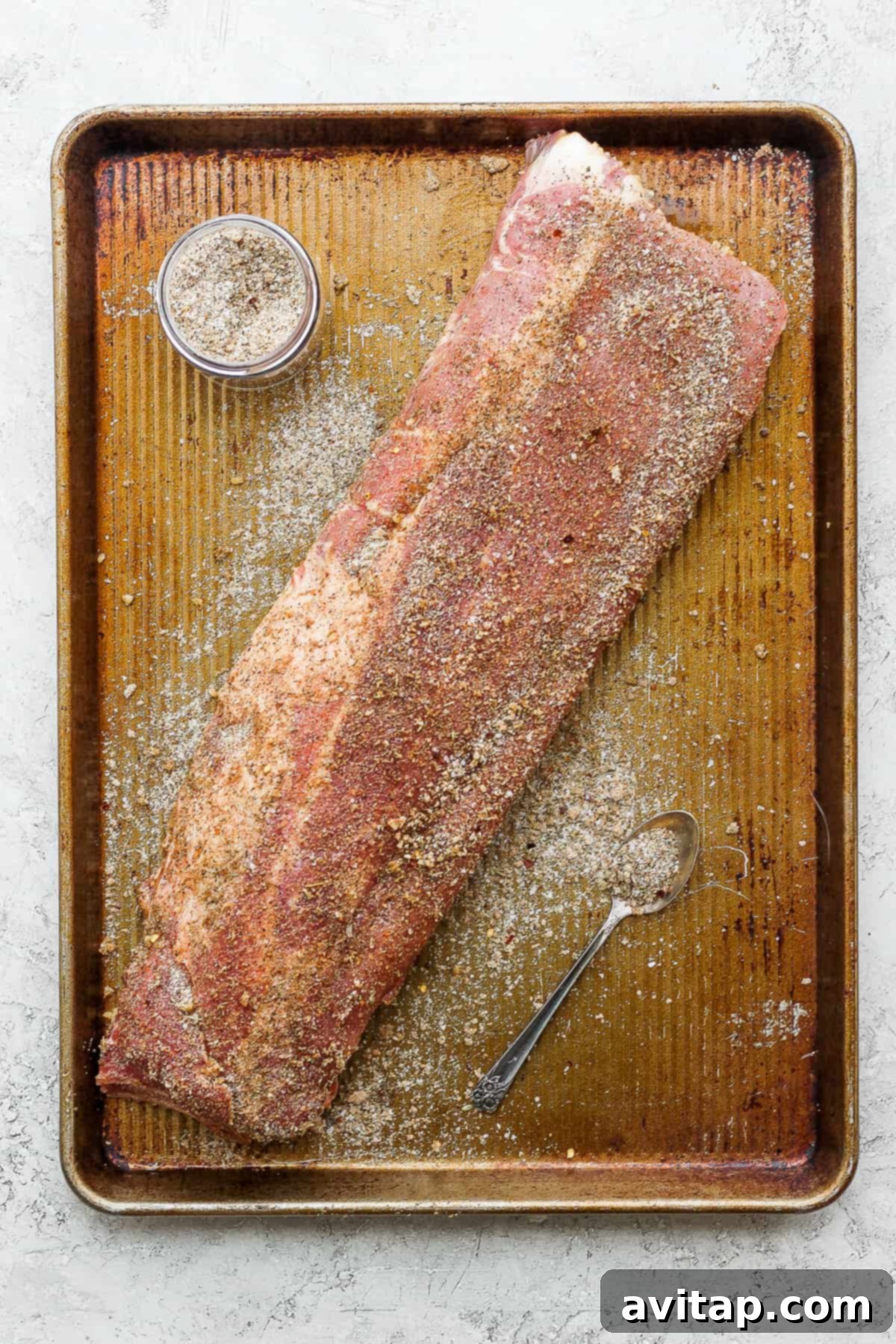 Dry rub on a rack of ribs.