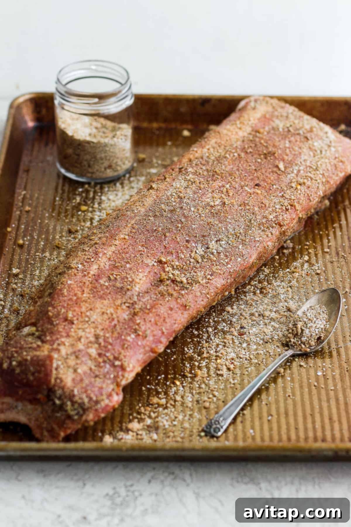 Dry rub on a rack of ribs.