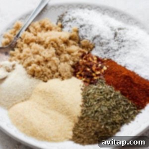 a white plate topped with different types of spices.