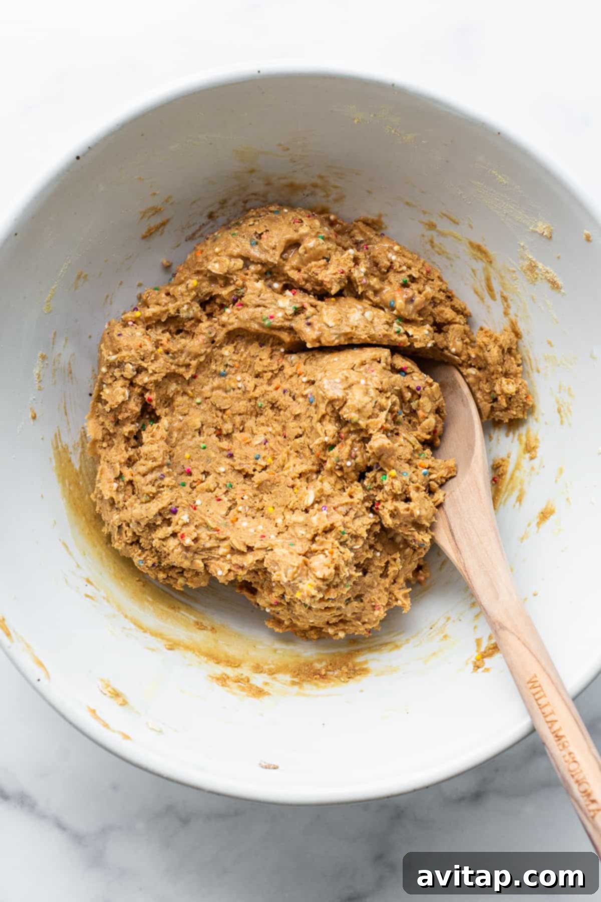 Protein cake pop dough mixed in a bowl, ready for rolling.