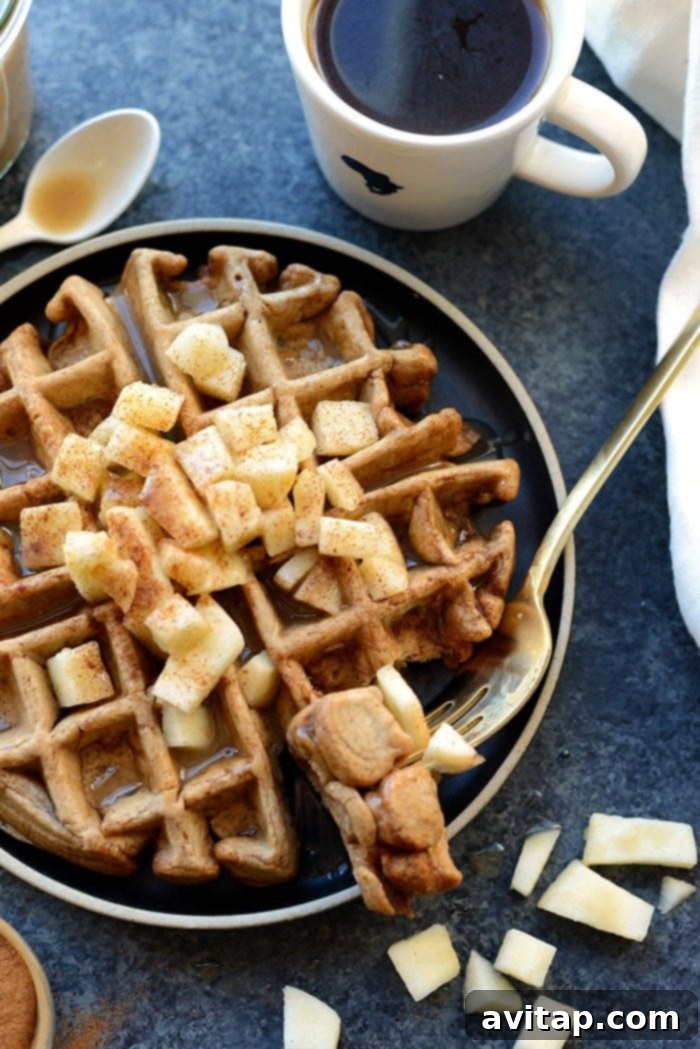 Spiced Apple Cinnamon Waffles 5 A beautifully composed shot of apple cinnamon waffles, perfectly golden and ready to be served.