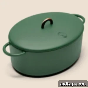 A stylish Dutch oven on a plain background, ready for cooking.
