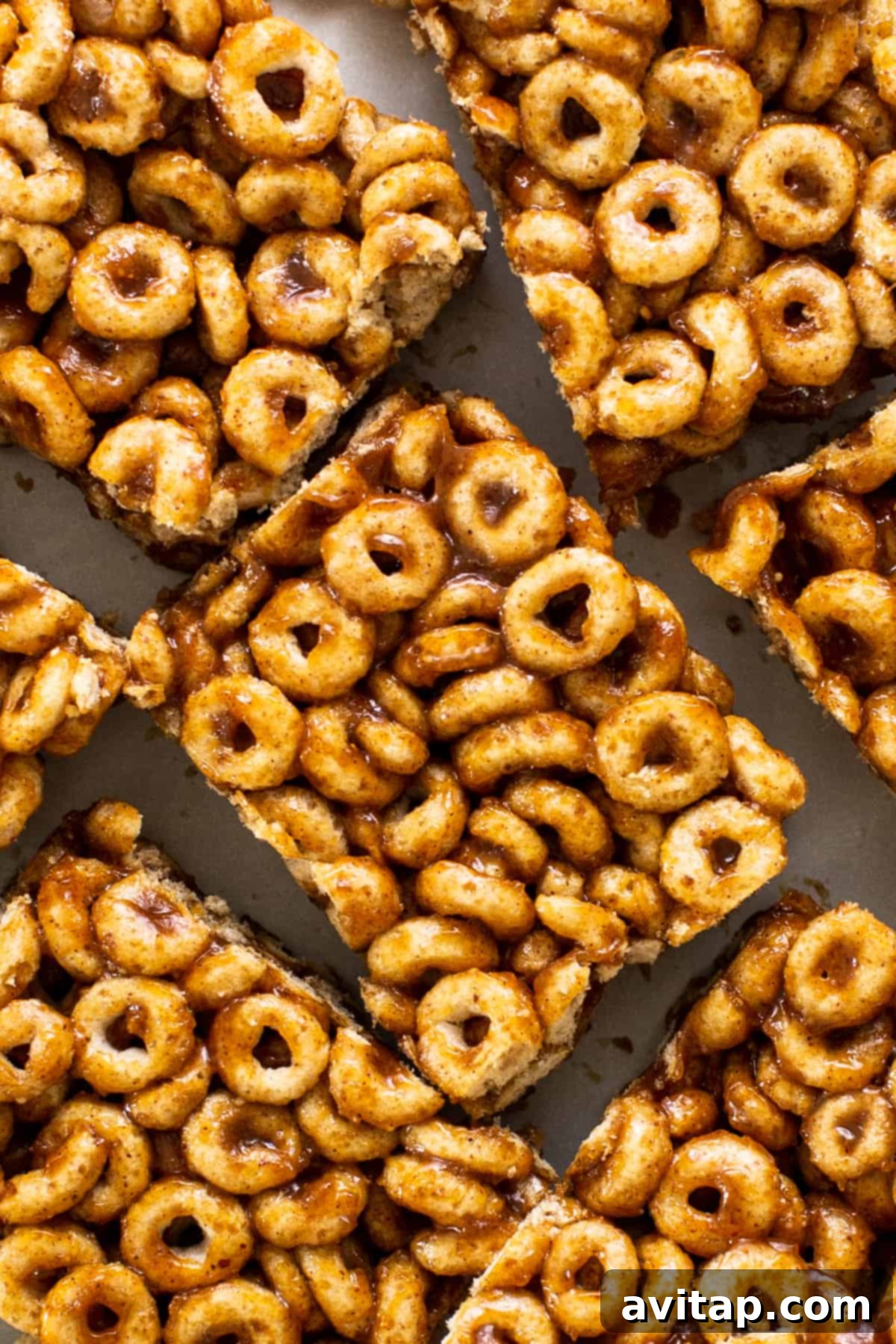 Pumpkin Spice Peanut Butter Crunch Bars 6 Cereal krispy bars are stacked on top of each other.