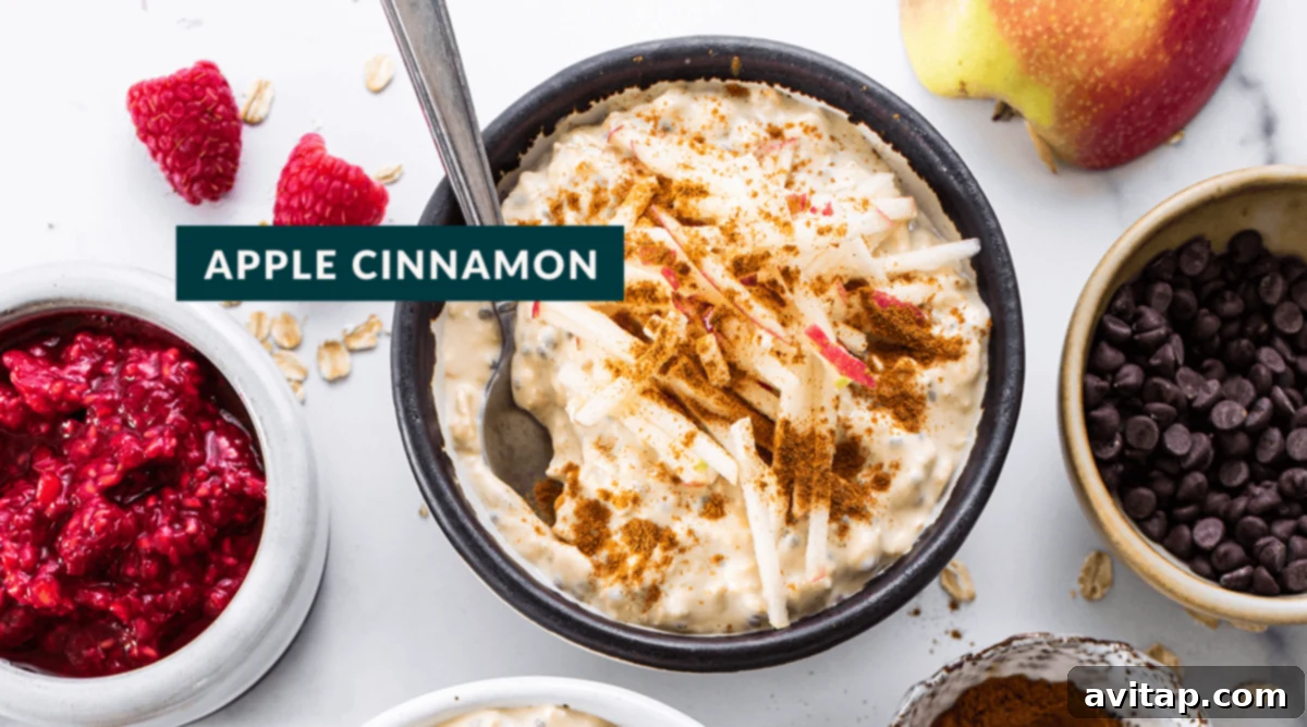 Protein Overnight Oats Three Delicious Varieties 6 A close-up of apple cinnamon protein overnight oats, garnished with thinly sliced apples and a sprinkle of cinnamon, presenting a warm and inviting look.