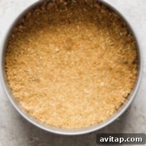 A pie crust in a bowl on a table.