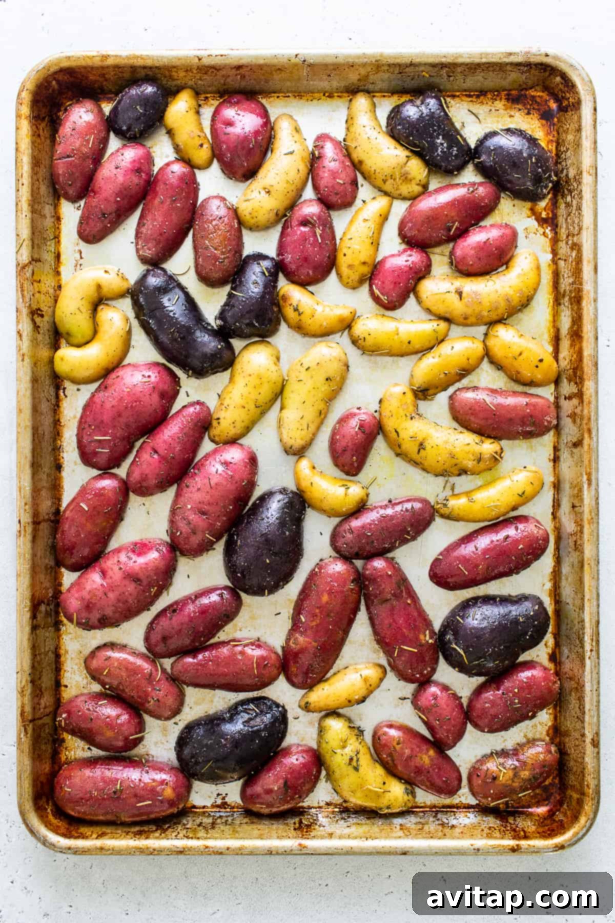 fingerling potatoes on baking sheet.