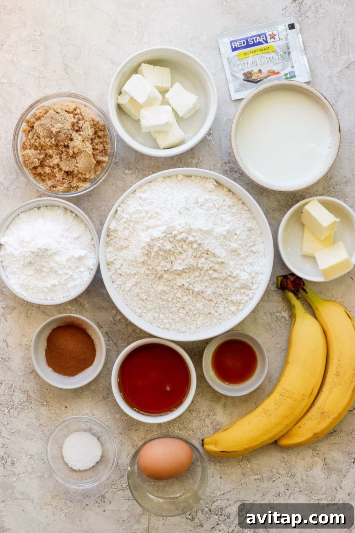 The ingredients for banana bread are shown on a table.
