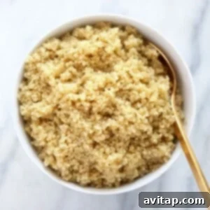 A bowl of perfectly cooked quinoa, ready to be incorporated into delicious meals.