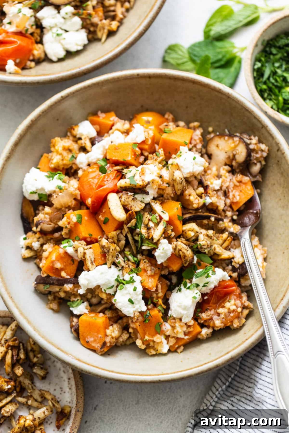 A bowl of roasted squash and feta risotto.