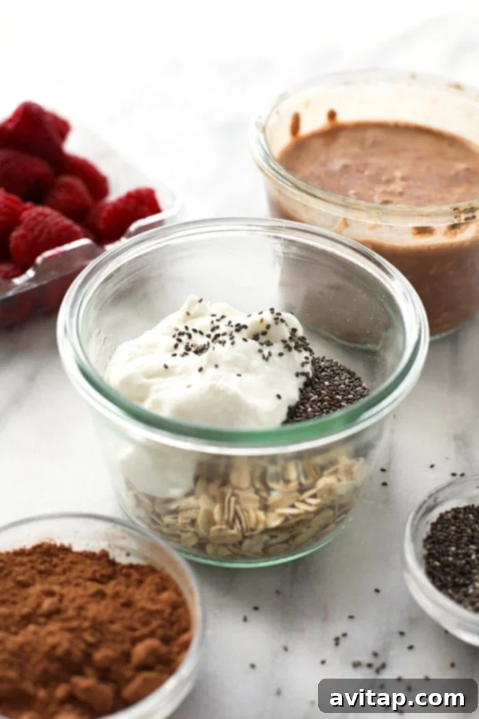 Quick and healthy chocolate raspberry cheesecake overnight oatmeal for an indulgent breakfast.