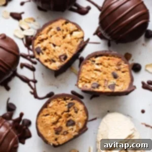 Chocolate covered peanut butter cups with a scoop of ice cream, illustrating serving suggestions.