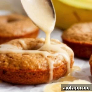 Banana Bread Ring Treats 15 Drizzling icing onto freshly baked banana muffins.