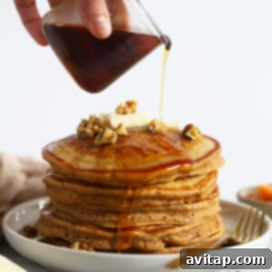 Sweet potato pancakes on a plate with syrup