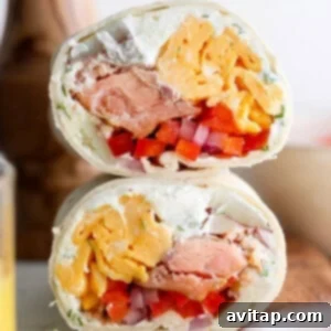 A rolled breakfast burrito, displaying its golden-brown tortilla and the potential for a satisfying meal.