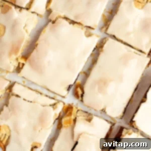 Fit Frosted Pastries 8 Top view of frosted protein pop tarts laid out in a grid pattern on a white surface, showcasing their appealing presentation.