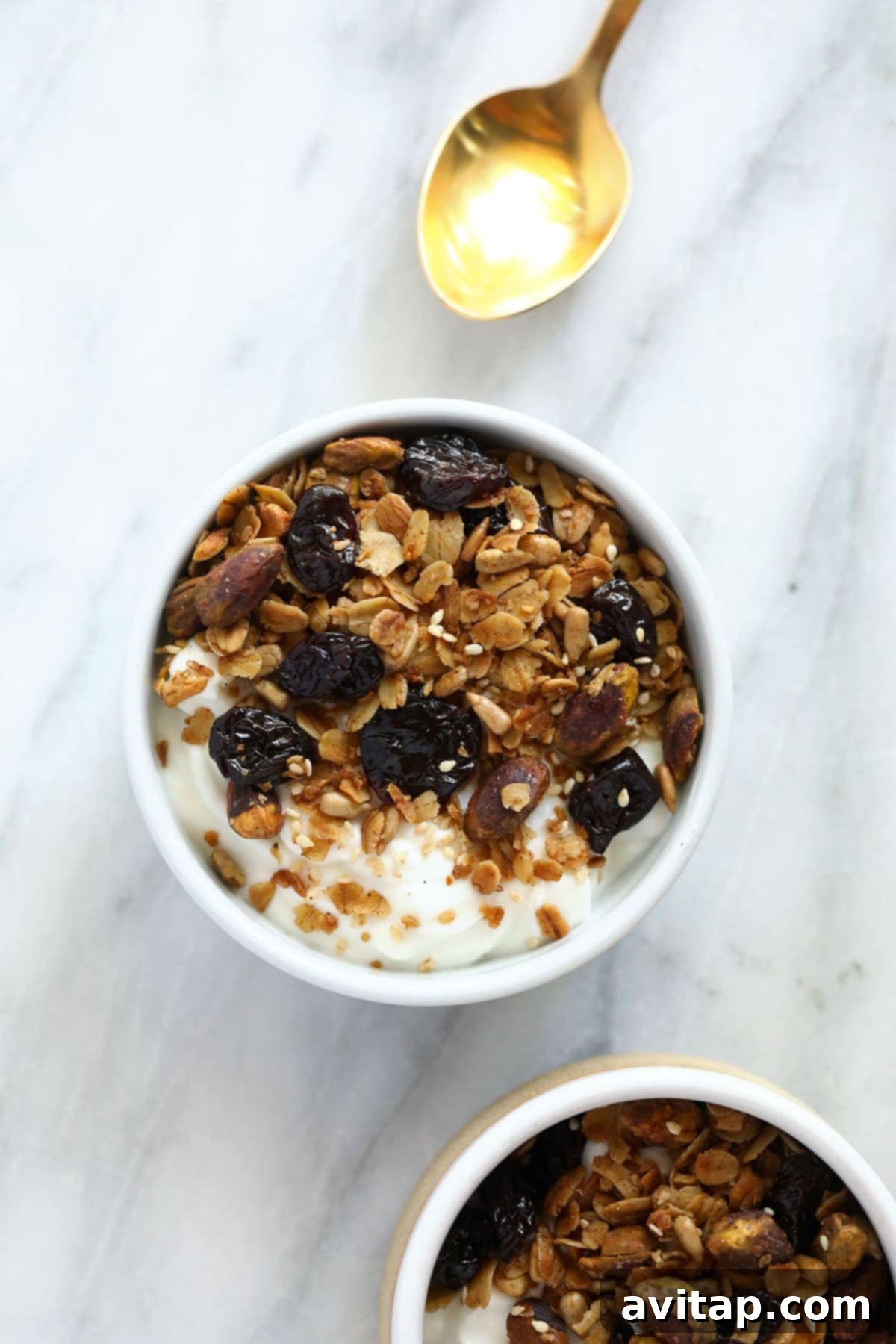 Artisan Pistachio Cherry Granola 6 Granola on top of yogurt.