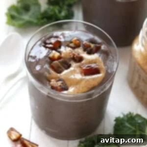 Close-up of a rich, creamy Dark Chocolate Date Protein Smoothie in a glass, ready to be enjoyed.