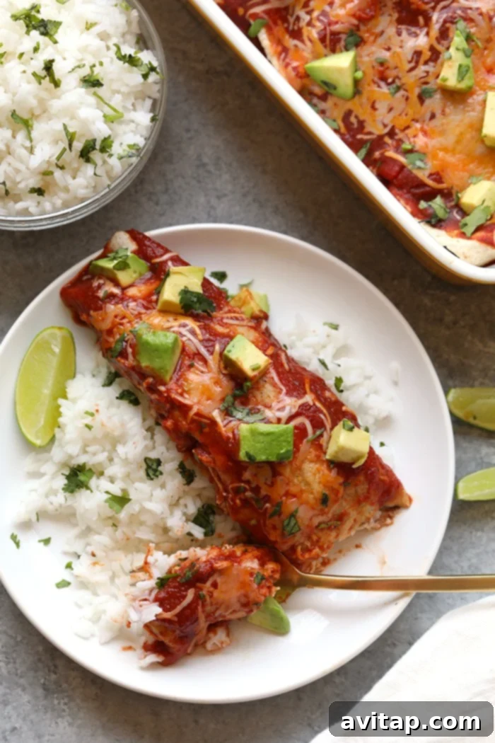 Healthy Chicken Enchiladas on a plate ready to be served