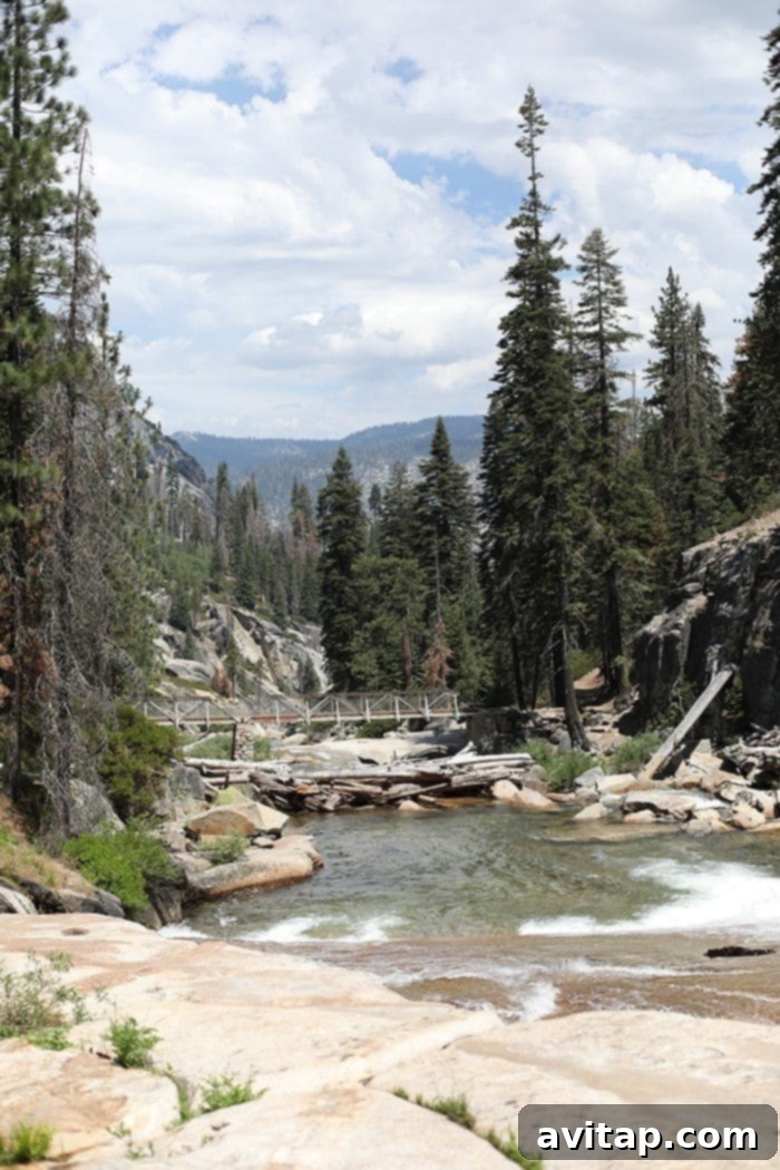 Hikers on the Panorama Trail with sweeping views of Yosemite's iconic landscape
