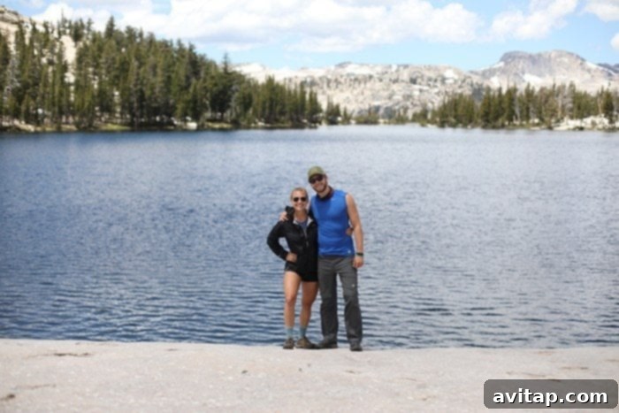A serene view of Lower Cathedral Lake surrounded by granite peaks in Yosemite