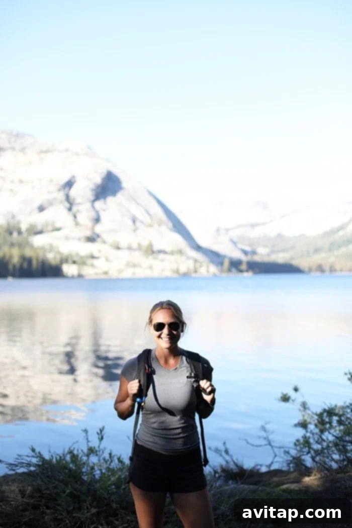 Hikers enjoying the pristine waters of Tenaya Lake in Yosemite's High Sierra