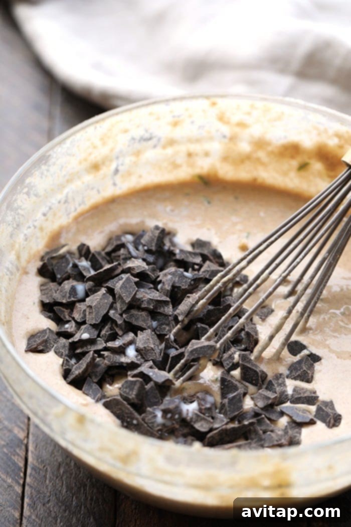 Thick, rich waffle batter ready to be poured into the waffle iron.