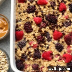 A close-up of the delicious Dark Chocolate Berry Baked Oatmeal, ready to be served