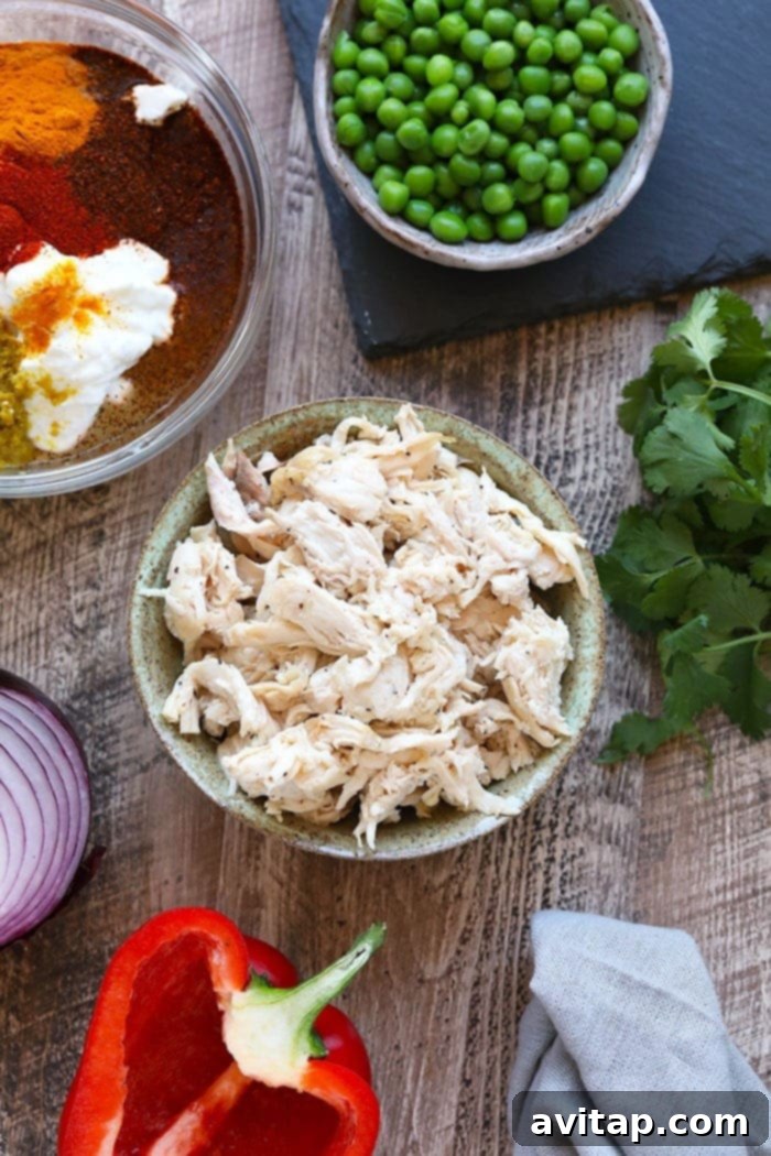 Golden Curry Chicken Salad 4 All the fresh ingredients for the curry chicken salad laid out, including chicken, vegetables, and curry paste