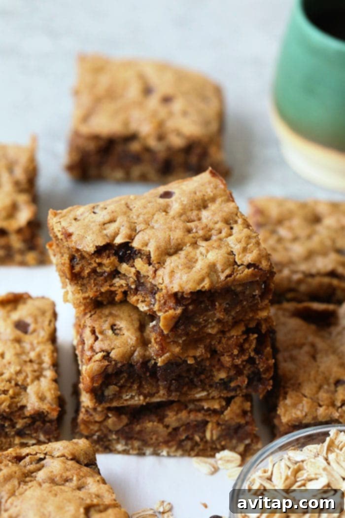 Stack of Peanut Butter Oatmeal Cookie Bars with chocolate chips