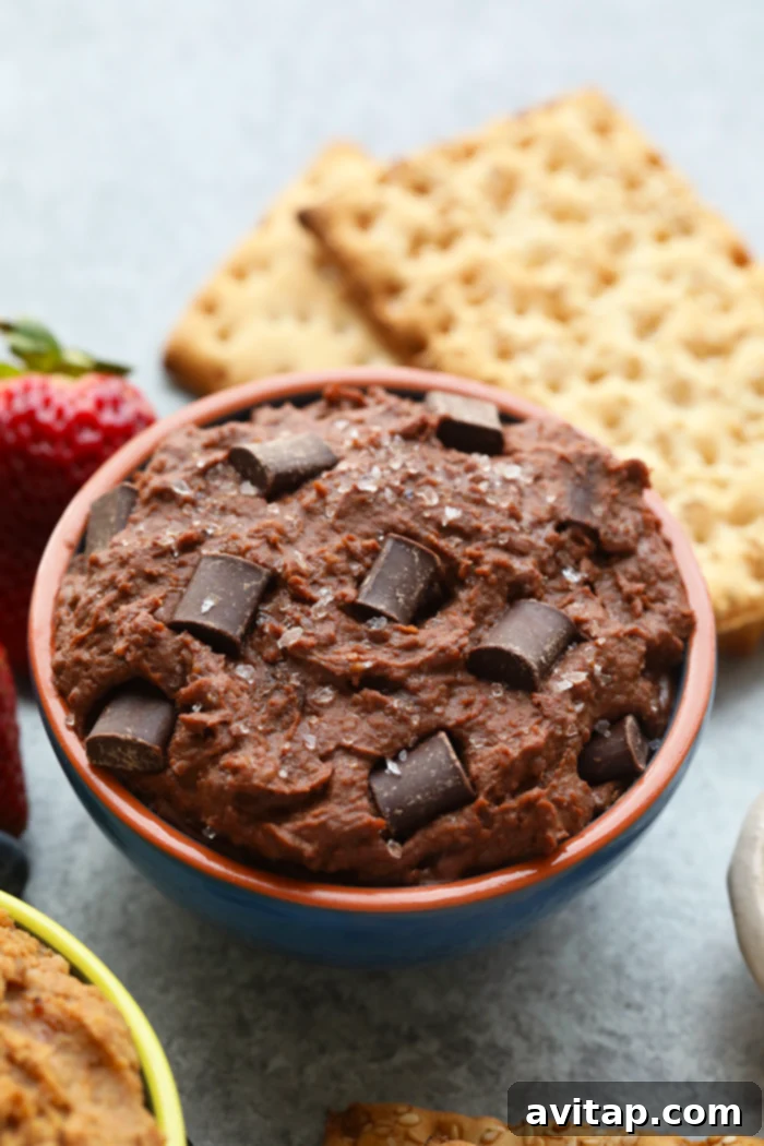 Brownie Batter Sea Salt Cookie Dough Dip in a dark bowl.
