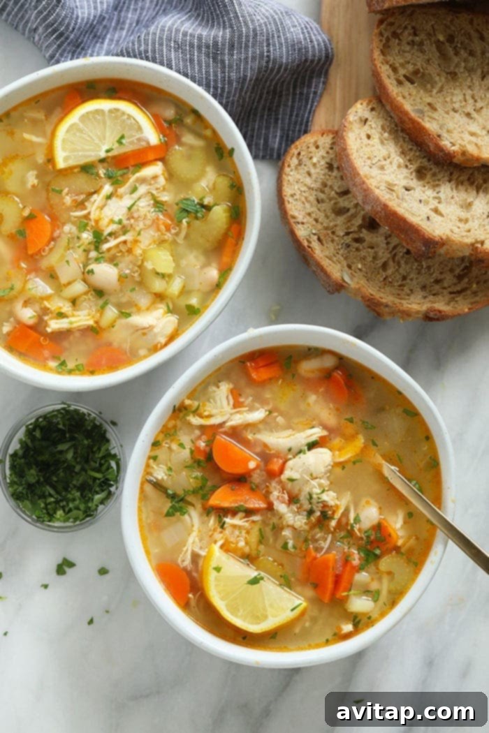 The healthy chicken soup that will make you feel better in an instant. Meet our amazing Chicken Quinoa Soup that's naturally gluten-free, protein-packed, and flavor-filled. Chicken quinoa soup in bowls