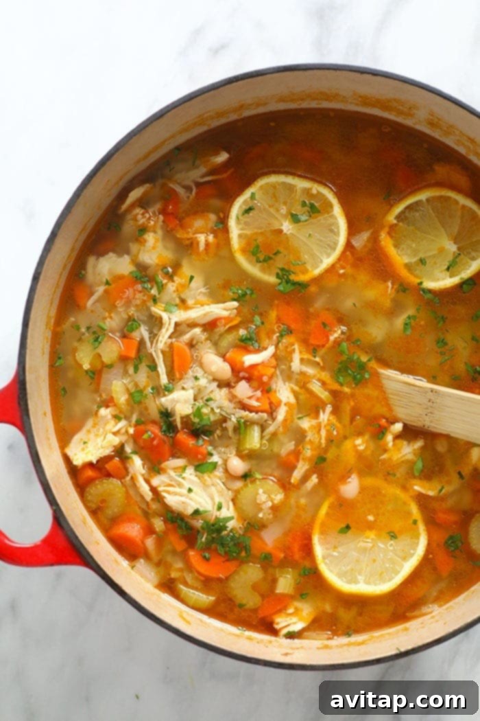 The healthy chicken soup that will make you feel better in an instant. Meet our amazing Chicken Quinoa Soup that's naturally gluten-free, protein-packed, and flavor-filled. chicken quinoa soup in a pot