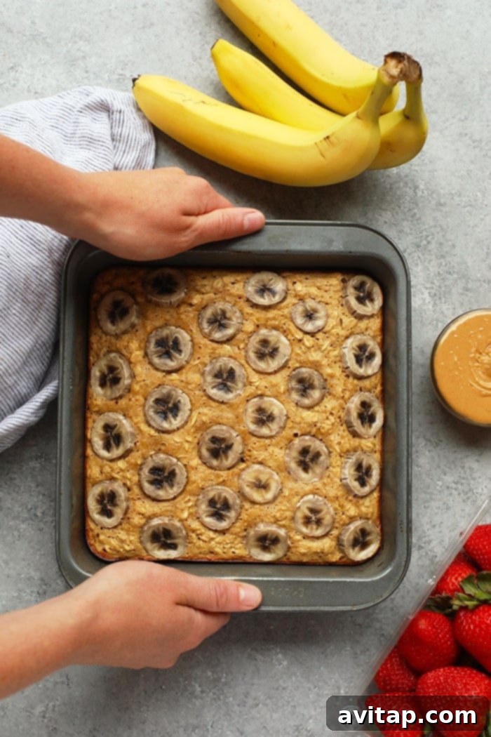 Baked oatmeal queens do we have a recipe for you! This Peanut Butter Banana Baked Oatmeal is perfectly sweetened with mashed banana and a little bit of maple syrup and gluten-free made with ground oat flour and rolled oats. Make this on the weekend for the family or during the week for a healthy breakfast meal prep recipe. baked oatmeal