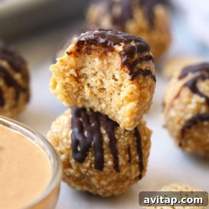 A bowl of crunchy peanut butter honey Chex balls, with a small scoop of peanut butter for dipping.