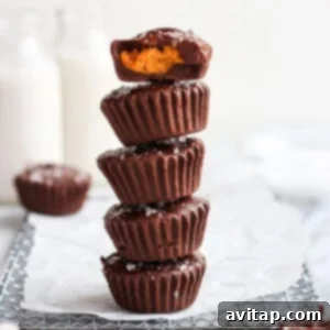 A delectable Pumpkin Peanut Butter Cup, showing its layers