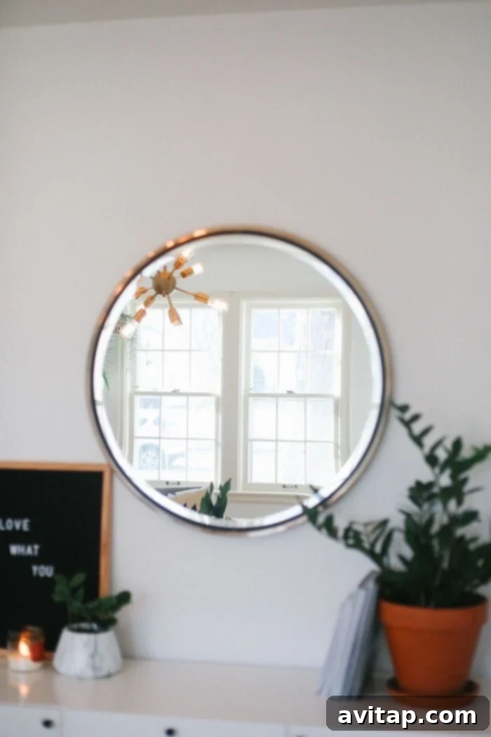 Gold Circle Mirror Above Buffet
