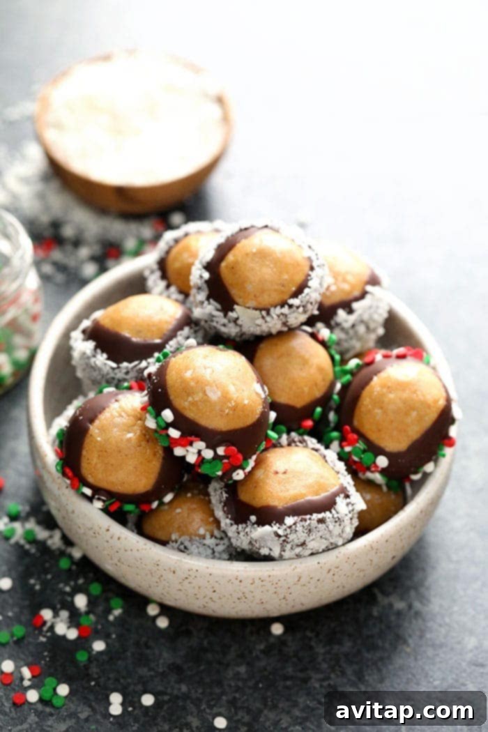 A bowl filled with healthy buckeyes, featuring peanut butter and chocolate, ready for holiday festivities.