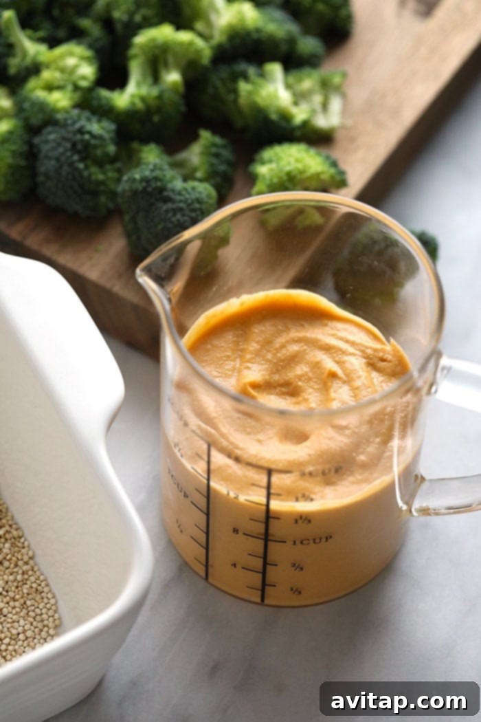 Creamy Vegan Cheese Sauce Close-up of creamy vegan cheese sauce, golden and smooth