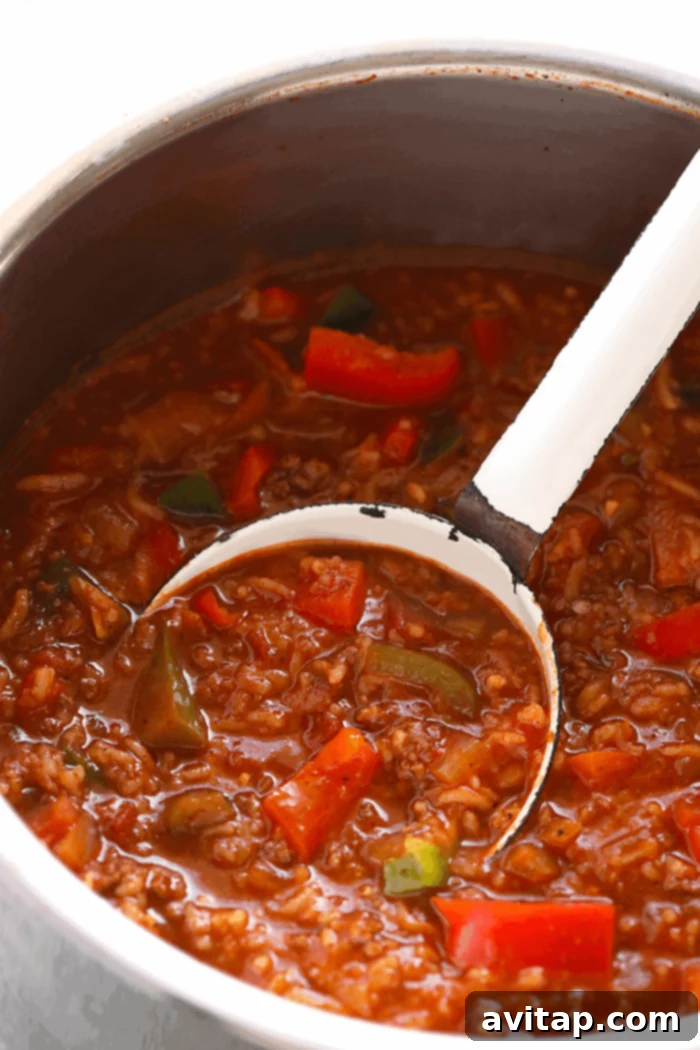 A delicious batch of Instant Pot Stuffed Pepper Soup, cooked to perfection and ready to be enjoyed. Prepared Instant Pot Stuffed Pepper Soup simmering in the Instant Pot after cooking, with steam gently rising.