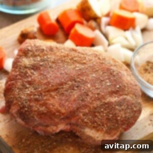 A delicious Instant Pot pork roast with vegetables, beautifully displayed on a cutting board.
