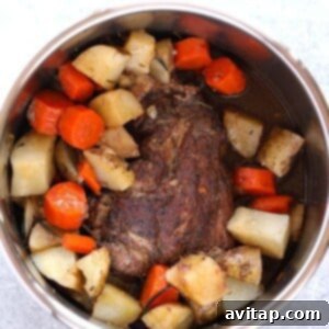 Instant Pot Pork Roast with carrots and potatoes.