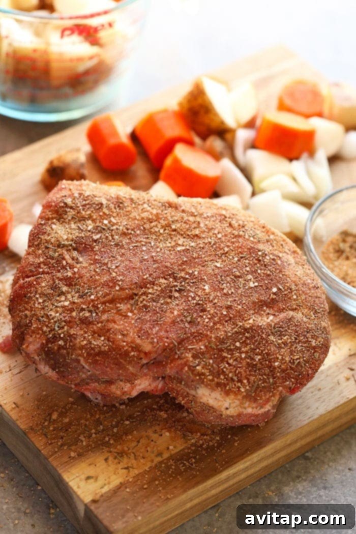 Dry rub on a pork shoulder roast