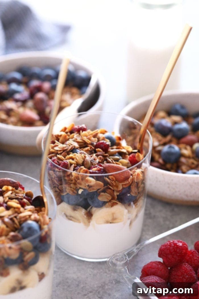 Healthy Homemade Granola: Perfect with Yogurt and Fruit A yogurt parfait with homemade granola and fresh fruit, a healthy and crunchy breakfast option.