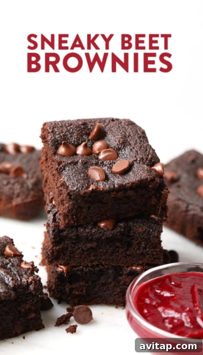 Fudgy, Paleo-Friendly Coconut Flour Brownies with Secret Beet Puree for a Healthy Twist. Stacked fudgy beet brownies, showcasing their rich texture and delicious appeal.
