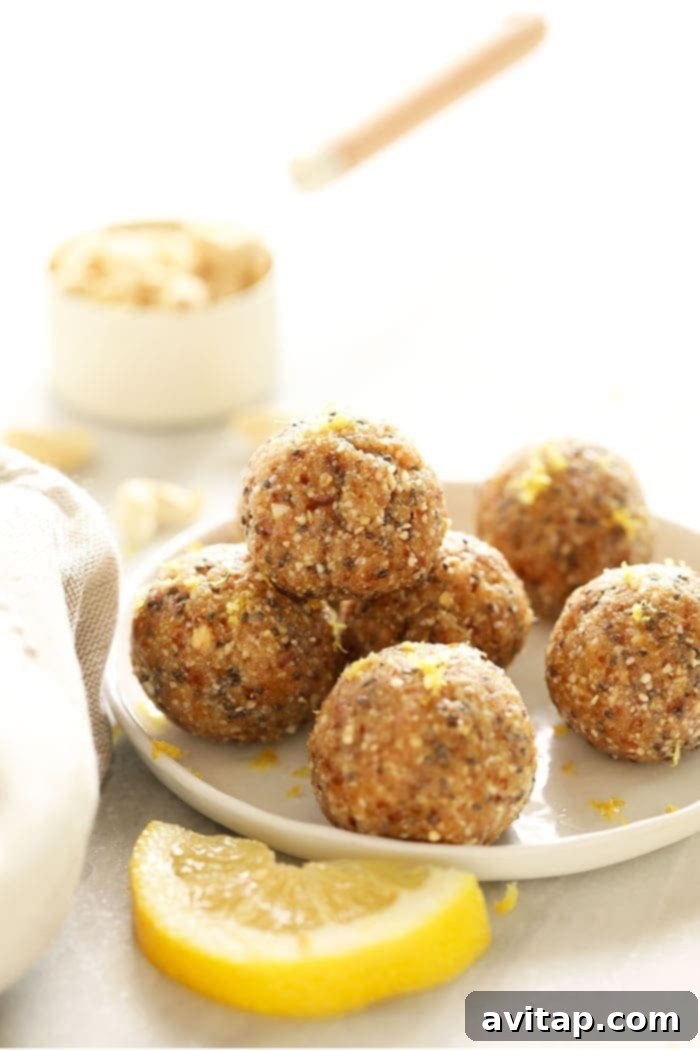Delicious Lemon Cake Energy Balls beautifully arranged on a white plate